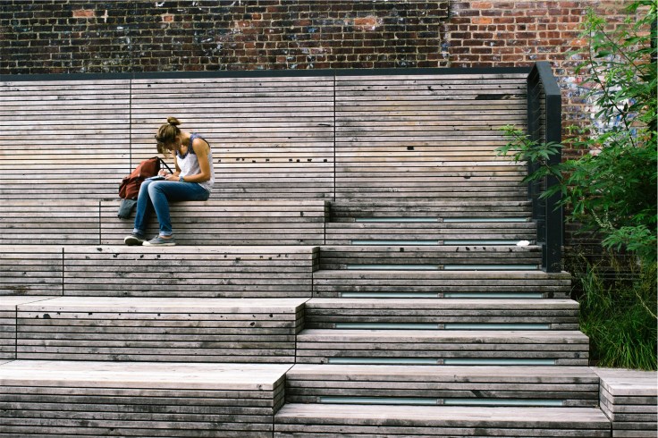 Girl on bleachers from stocksnap